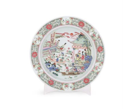 A Chinese Famille Rose 'Lotus pond' basin, in Yongzheng style, painted on the deep central medallion depicting maidens on boa