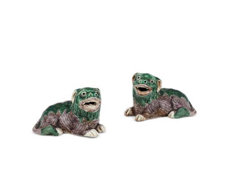 A pair of Chinese Famille Verte lions, Kangxi or later, glazed in green and aubergine glazes, 9 cm long x 5.5 cm high Provena