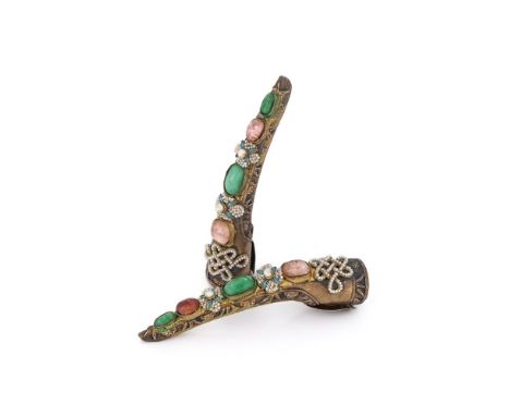 A pair of Chinese silver and gem mounted nail guards, Qing dynasty, 19th century, the openwork guards applied with jade, tour