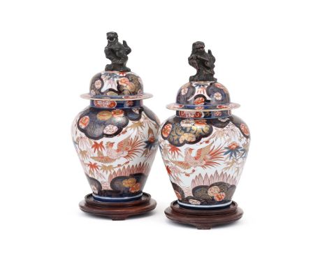 A pair of Samson or Continental Imari vases, late 19th century, in Japanese Arita style, 34cm high, wood stands (2)   Conditi