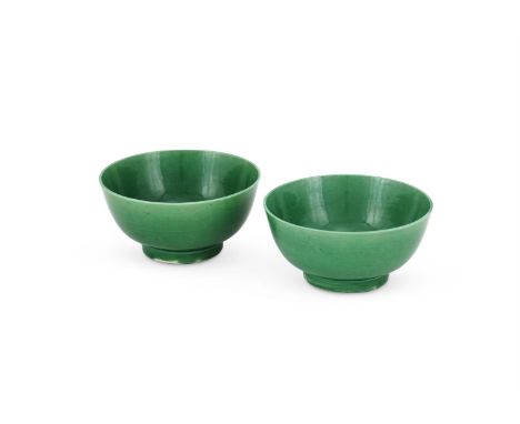 A pair of Chinese green-glazed bowls, Kangxi, 11.2cm diameter (2)清康熙 綠釉碗一對  Condition Report:  one bowl with very fine hairli