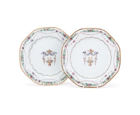 A pair of Chinese Export Famille Rose plates, Qianlong, decorated in gold and various overglaze enamels painted with hands ra