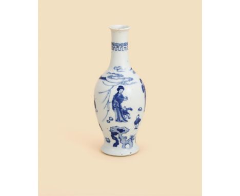 A Chinese blue and white vase, Kangxi, painted to the exterior with ladies and boys at play in a fenced garden, 17.2cm high清康