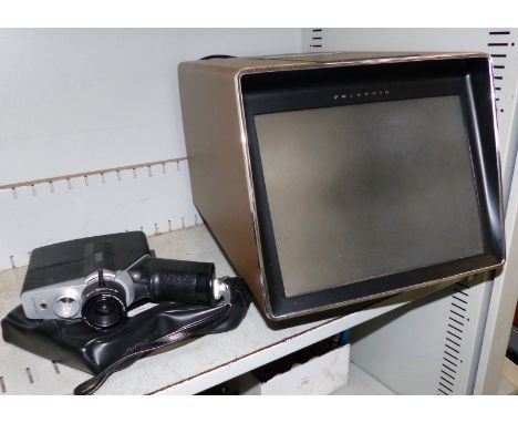 A Polaroid Polavision phototape hand cassette camera, type 608; a Polavision hand player