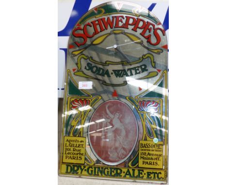 A Schweppes soda water mirror backed clock