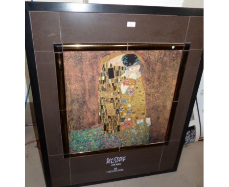 A ceramic picture of 'The Kiss' by Gustav Klimt, in large tiled frame