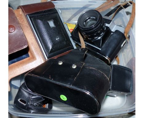 A Ross folding camera; a Zenit camera; a Pentax 110 camera with 24 x 50 m lenses; other photographic items; a Dinky 693 7.2 H