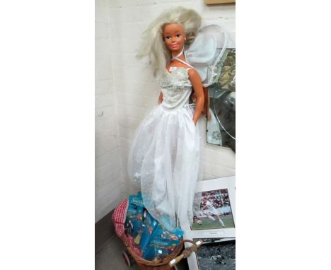 Seven Mattel boxed sets "Snow White and the Seven Dwarfs"; a large doll; a dolls wicker pram