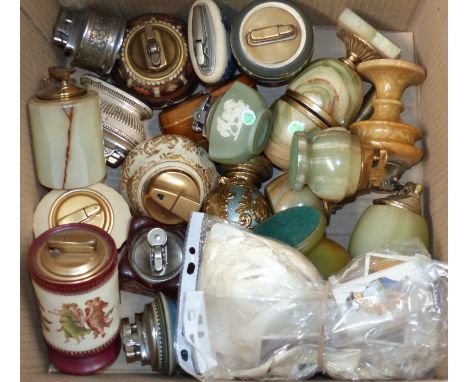 Approximately 20 decorative table lighters, ceramic, onyx and metal; a selection of unmounted cigarette silks