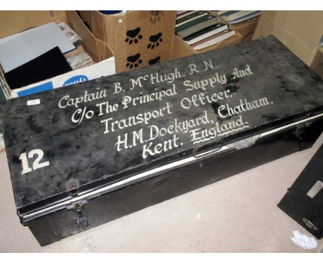 A WWII naval captain's metal trunk containing captain's uniform