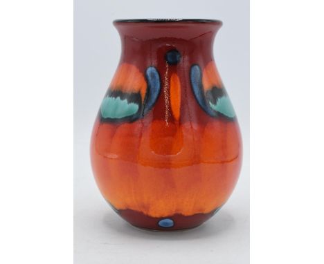 Poole Pottery bulbous vase in traditional colours, 17cm tall.  In good condition with no obvious damage or restoration.