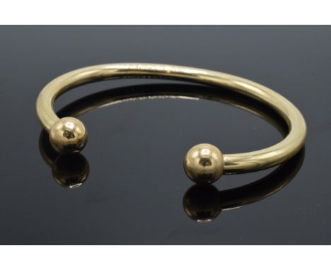 9ct gold torque bangle, 7.5 grams.  Modern, hollow.