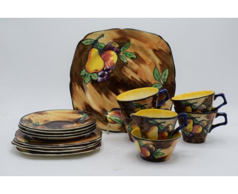 Hollinshead and Kirkham of Tunstall (H&amp;K) pottery tea ware decorated with a fruit scene to include 4 cups, 4 saucers, 4 s