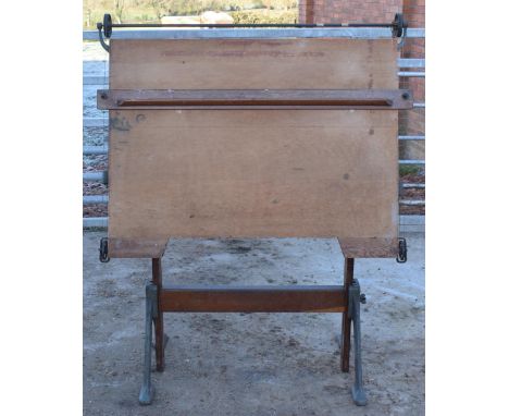 Antique early 20th century adjustable draughtsman table by B.J. Hall, 118cm wide, with adjustable shelf.  