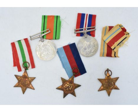 World War 2 medals to include The Italy Star, The Africa Star, The 1939-1945 Star, The 1939-1945 War Medal and The Defence Me