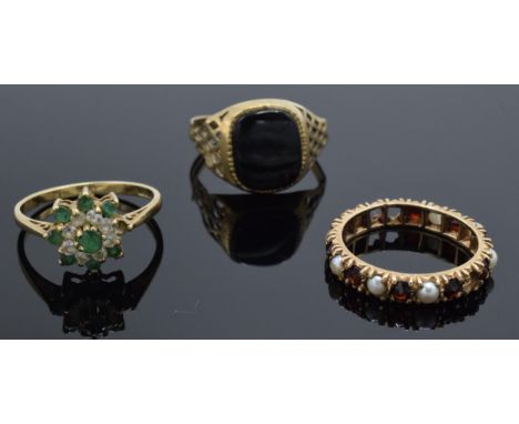 A trio of 9ct gold rings to include 2 ladies stone set rings (missing stones) and a gents onyx ring (split to shank), 7.4 gra