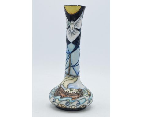 Boxed Moorcroft Winds of Change bud vase, 21cm tall, first quality.  In good condition with no obvious damage or restoration.