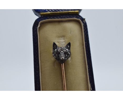 Diamond and ruby set fox head stick pin with 9ct gold pin, 6.5cm long.  