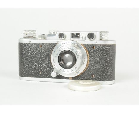 A Leitz Wetzlar Leica II Camera, serial no. 191 233, 1936, body F-G, shutter working, with a Leitz Elmar 5cm f/3.5 collapsibl