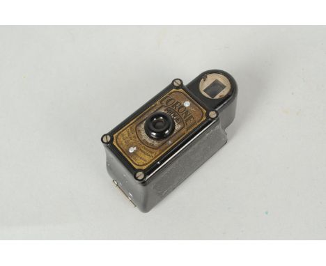 A Black Coronet Midget Subminiature Camera, for 16mm film, body F, front plate faded, viewfinder F, two internal spools