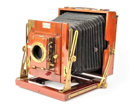 A Houghton mahogany and brass half-plate "Sanderson Junior" Field Camera,  with Sanderson movements, fitted with Thornton-Pic