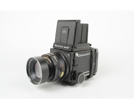 A Mamiya RB67 Pro S Camera, serial no C226250, shutter working, focus runs freely, bellows G, body G, some scratching to edge