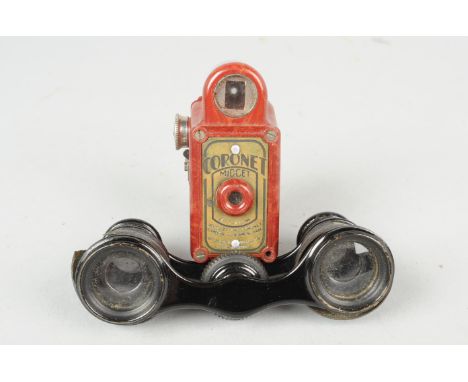 A Red Coronet Midget Subminiature Camera, for 16mm film, body F, front plate faded, viewfinder P, with single internal spool;