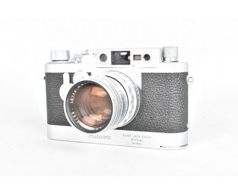 A Leitz Wetzlar Leica IIIg Camera with Leicavit, serial no. 827 329, 1956, body G-VG, shutter and self timer working, with Le