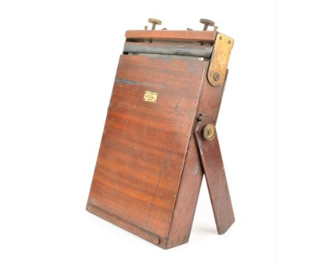 A 19th Century mahogany and brass Thomas Collodion Wet-Plate Dipping or Sensitising Bath,  the glass chamber mounted in mahog
