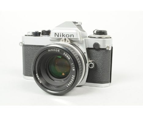 A Nikon FE SLR Camera, chrome, serial no 4014099, shutter working, meter responsive, timer working, body VG, minor scratches 