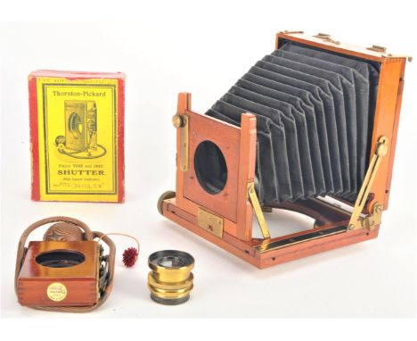 An early 20th Century mahogany and brass 3in x 4in Thornton-Pickard 'Tribune' Field Camera,  with one dds, unfitted Thornton-