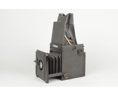 A Kershaw Patent Reflex Camera, 3¼in x 4¼in format, serial no 22698-04, retailed by J C McKechnie Castle St Edinburgh, body G