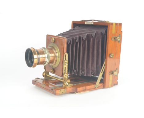 A late 19th Century mahogany and brass half-plate Lancaster  'The 1898 Instantograph Patent' Field Camera,  with over-size La