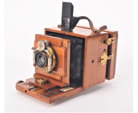 An early 20th Century mahogany and brass 3in x 4in Watson &amp; Sons 'Alpha' Hand and Stand Camera,  with Watson convertible 