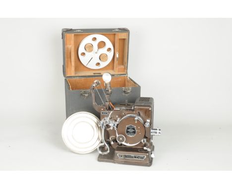 An Eastman Kodak Kodascope Model B Automatic Threading 16mm Projector,  serial no. K 17787, circa 1930, lamp missing, body G-