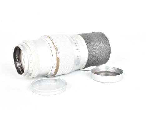 A Leitz Wetzlar Hektor 135mm f/4.5 Lens, serial no. 717 689, barrel F, scratches and wear to focusing ring, elements F, clean