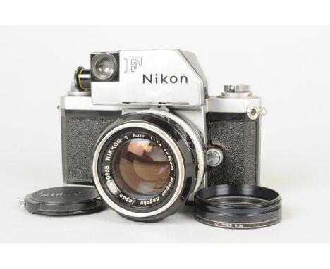 A Chrome Nikon F Photomic Model II SLR Camera serial no. 6 702 182, body F-G, shutter working, meter untested, prism no. 9689