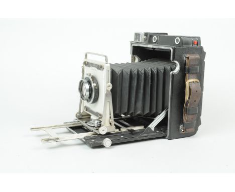 A Graflex Crown Graphic Special, serial no 932041, body G, slight wear to back, tripod mount, bellows G, rangefinder appears 