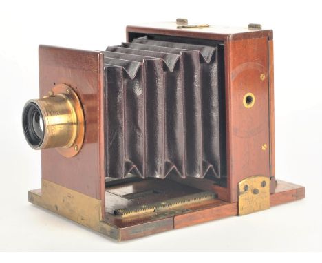 A 19th Century  mahogany and brass quarter-plate Rouch Tailboard Field Camera,  with inset maker's plate 'W W Rouch &amp; Co,