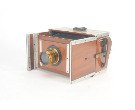 An early 20th Century teak and aluminium half-plate Shew Aluminium Xit-type Camera,  unmarked, with two dds and Taylor, Taylo