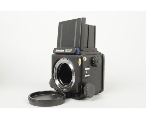 A Mamiya RZ67 Professional Camera Body,  serial no 107165, shutter working, body G-VG, some marks to top of focusing hood, li