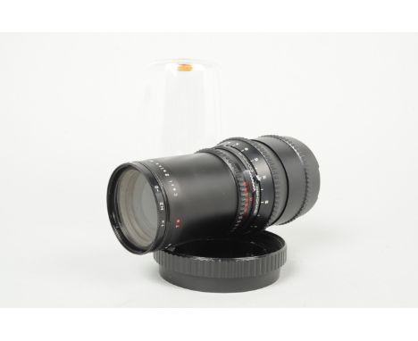 A Carl Zeiss T* 250mm f/5.6 Sonnar Lens, serial no 5756138, barrel VG, very light wear to mount, elements VG, slight internal