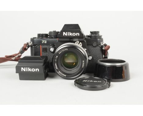 A Black Nikon F3 SLR Camera, serial no. 1 306 805, body G, shutter working, meter responds to light with a Nikkor 50mm f/1.8 