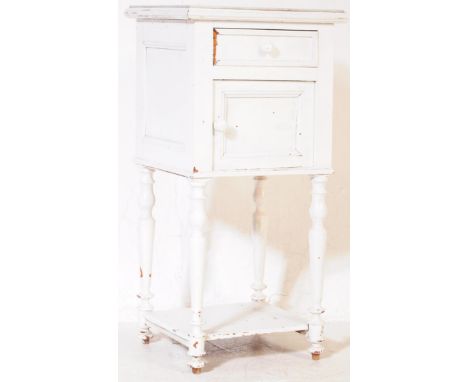 A vintage 20th century painted French bedside pedestal pot cupboard. Of square form with marble top, with single drawer above