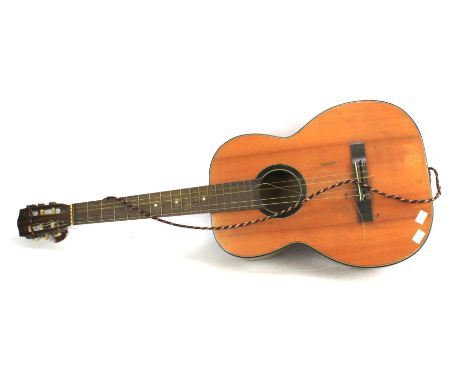 A classical acoustic guitar. Unbranded, in a vinyl case