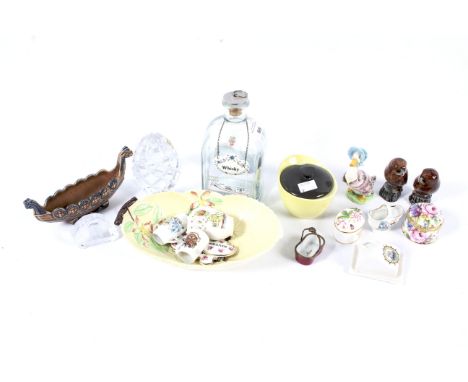 An assortment of mixed ceramic and glass collectables. Including Beswick Beatrix Potter's 'Jemima Puddleduck', Wade Viking bo