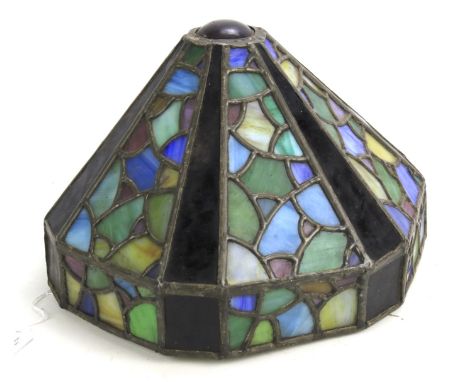 A leaded stained glass table lamp shade. Of geometric design in multiple colours, diam 30cm