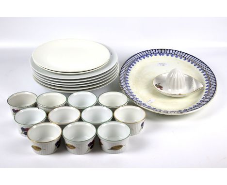 An assortment of Evesham ceramics and a set of Royal Worcester plates. Including a lemon juicer and multiple pots, together w