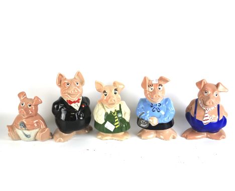 Five assorted Wade ceramic piggy banks for Natwest. Each a different character