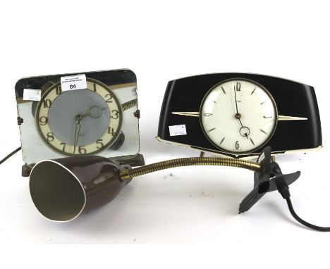 Two contemporary clocks and a lamp. Comprising a Smiths example with silvered dial and Arabic numerals, 15.5cm high and a Met